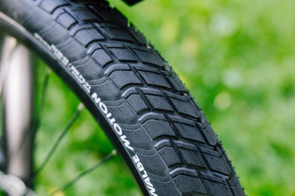 Schwalbe Pneu Motion Big Apple 28x2.15 Addix Green starr mit Reflexstreifen black  Produktbild 5